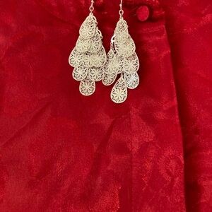 Silver tone teardrop dangly earrings with a boho vibe